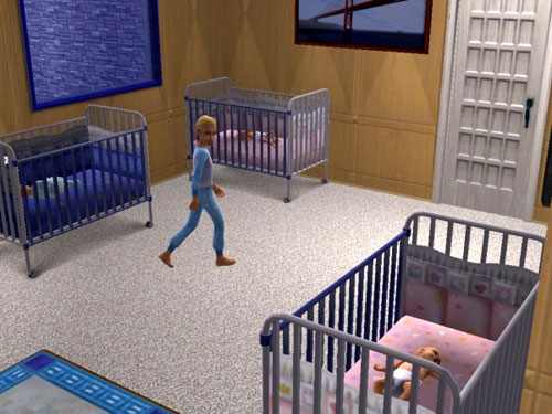 Aaron walks through the foyer, between a blue crib and two pink ones