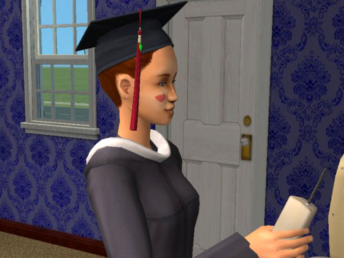 Candice in cap and gown, on the phone.