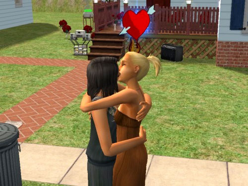 Danielle kissing a blonde