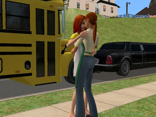 Nicole and Dawn slow dancing by the school bus