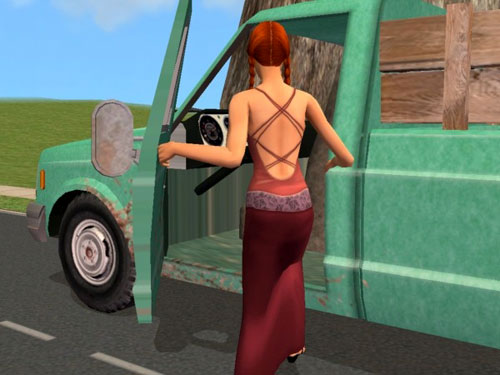 The gardener, still in her gown, returns to her truck